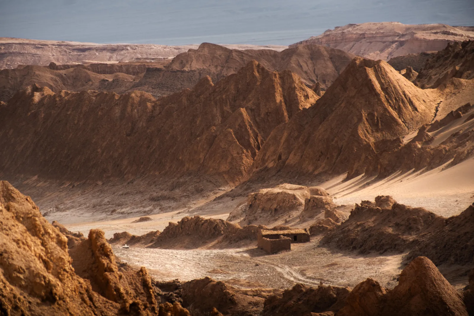 Eroded ridges and sand slopes of Valle de la Luna seen from above